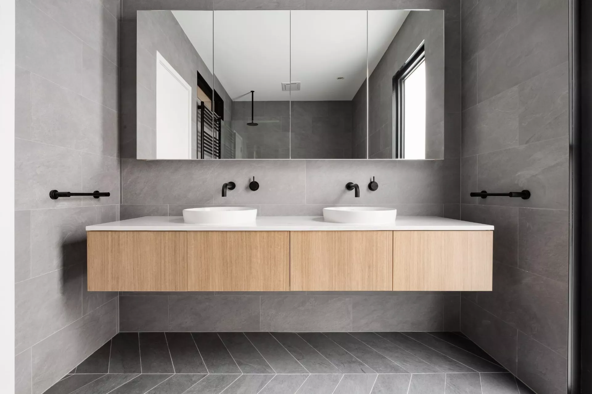 Grey tiles in modern bathroom
